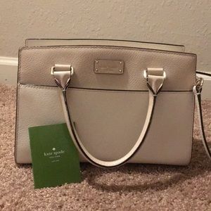 Kate Spade, lightly carried bag. Beige and white.